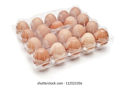 brown eggs in a carton transparent package.