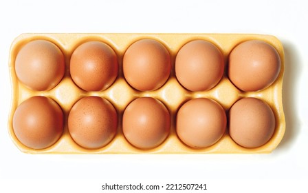 Brown Eggs In The Expanded Polystyrene Container Box Isolated On White  Background. Plastic Trash. Close-up, Direct Down. 