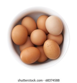 Brown Eggs In A White Bowl.  Overhead View, Isolated On White.