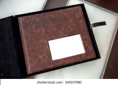 Brown Elegant Wedding Album Cover On A Table