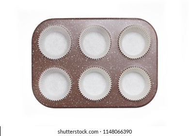 Brown Empty Cupcake Tray With Paper Forms On White Background