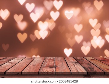 Brown Empty Wooden Table Top Isolated Red heart Background. wood table in front can be used for display or montage your products.Mock up for display of product