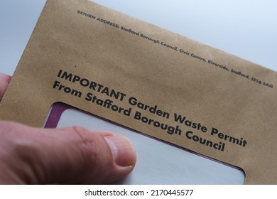 Brown Envelope With The Garden Waste Permit From Stafford Borough Council Wtih The Sticker For A Brown Waste Bin. Staffod, United Kingdom, June 21, 2022.