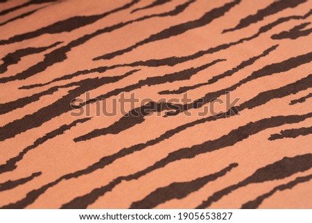 Brown fabric texture with pattern as a background.