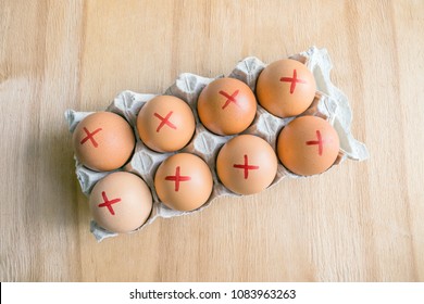 Brown Farm Eggs With Red Cross In White Carton. Eggs Recall Over Salmonella. How To Buy Safest Eggs After Recall. Top View