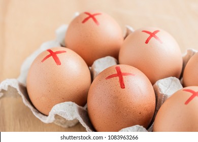 Brown Farm Eggs With Red Cross In White Carton. Eggs Recall Over Salmonella. How To Buy Safest Eggs After Recall, Selective Focus, Close Up