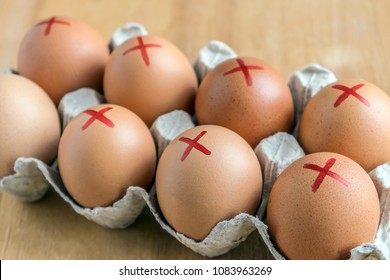 Brown Farm Eggs With Red Cross In White Carton. Eggs Recall Over Salmonella. How To Buy Safest Eggs After Recall