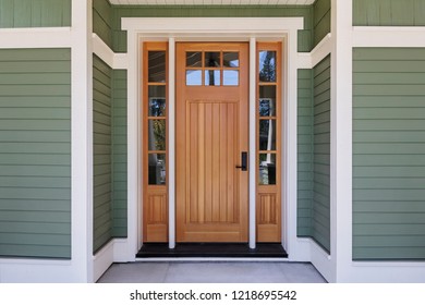 Brown Front Door, Front View With Green Trim. Bend, Oregon 