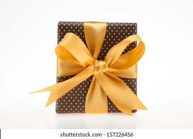 Brown Gift Box With Dots With Golden Ribbon Top View