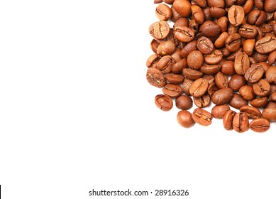 Brown grains of fried not ground coffee in the form of a heap and signs. - Shutterstock ID 28916326