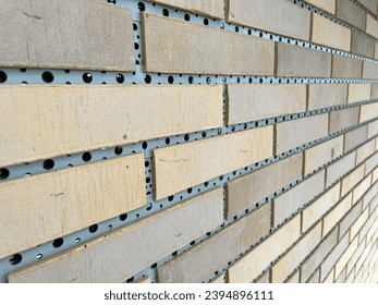 Brown grey clinker tile on metal frame background picture.