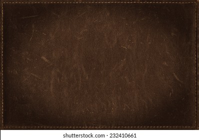 Brown grunge background from distress leather texture 