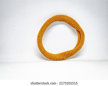 Brown Hair Tie Isolated On White Background, Round Shape