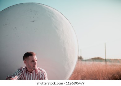 brown haired man posing
