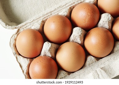 brown hen eggs in carton box - Shutterstock ID 1929112493
