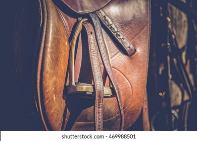 Brown Horse Saddle On Rural Fence