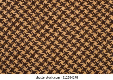 Brown houndstooth wool pattern. Dogstooth check design as background.