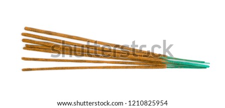 Brown indian incense aroma sticks isolated on white background close up. Set of buddhist incense stick for meditation top view