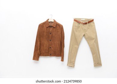 Brown Jacket ,shirt With Khaki Pants On Hanging 