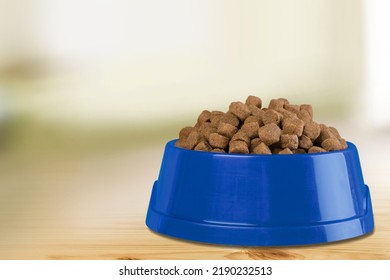 Brown Kibble Pieces For Cat Feed In A Bowl. Healthy Dry Pet Food