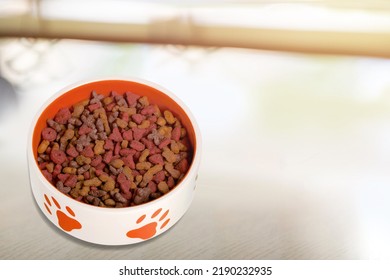 Brown Kibble Pieces For Cat Feed In A Bowl. Healthy Dry Pet Food