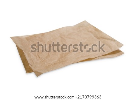 Brown kitchen bakery paper pieces top view isolated on white.Food serving dish.