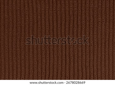 Brown knitted wool texture background. High quality photo