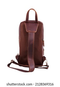 Brown leather backpack with one harness isolated on white background.