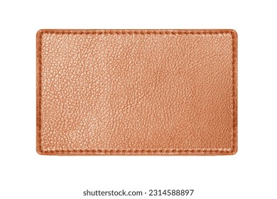 Brown leather belt strap closeup isolated on white. Brown stitched leather seam frame label tag isolated on white. Empty copy space fashion background. Textile frame cutout.
