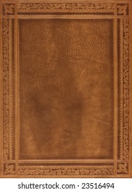 brown leather book or journal cover with a decorative floral ornament