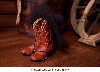 Brown leather boots and hat 