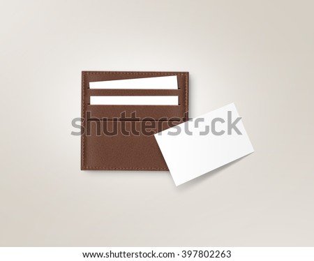 Brown leather card holder with blank white card mock up isolated on grey. Business credit cards mockup in sleeve cardholder pocket. Clear paper employee id cards in grey wallet box. Logo design card.