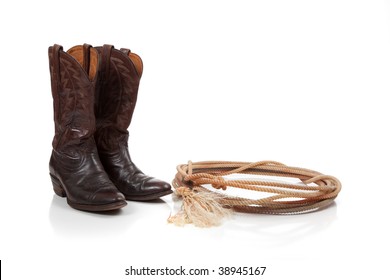 Brown Leather Cowboy Boots On A White Background