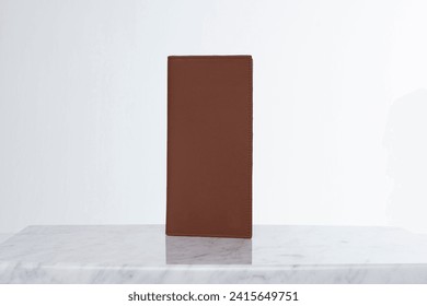 Brown leather men's wallet for credit cards and money on marble floor and white backdrop in studio - Powered by Shutterstock