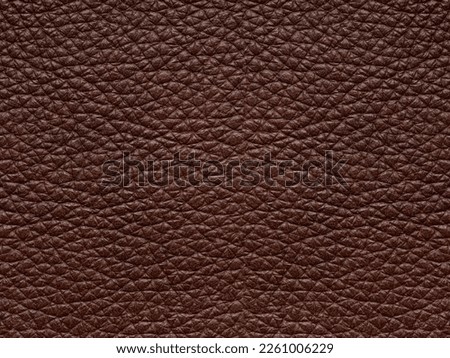 Brown leather natural texture, matte material, abstract background. Genuine quality empty pattern. Faux eco material. Can use as wallpaper or backdrop, text, lettering, wall screen saver, 3d art work.