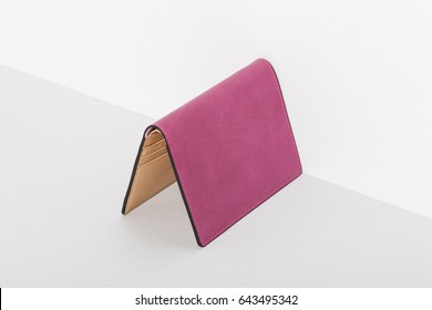 A Brown Leather Passport Case Opened On The Grey Background,