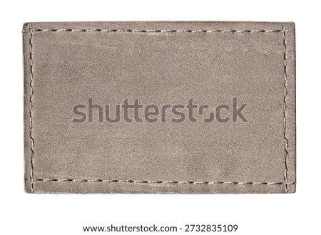 Brown leather patch with visible stitching, offering a customizable apparel label mockup