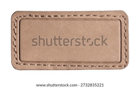 Brown leather patch with visible stitching, offering a customizable apparel label mockup