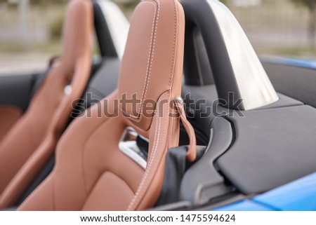 Brown leather sports car seat. 