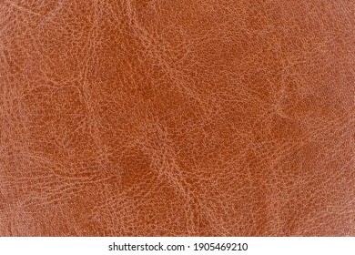 Brown leather surface. Diary notebook cover texture as a solid background