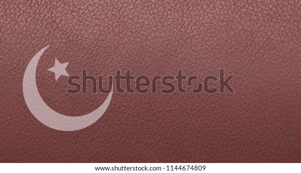 brown leather texture. background of leather,\
with Islamic symbols. Skin texture. Closeup of skin texture.\
Leather Products.\

