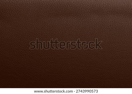 Brown leather texture background.Use for jacket sofa book cover tag shoes.Rich brown leather jacket close up, macro brown leather jacket texture, soft rugged grain pattern surface fashion design bg