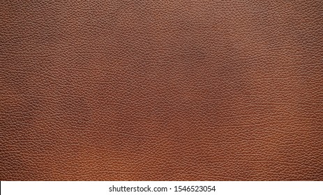 Brown leather texture used as a classic background.