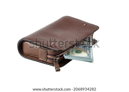 Brown leather wallet with bunch of american dollar bills, banknotes, cash money isolated on white background