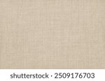 Brown linen fabric cloth texture for background, natural textile pattern.