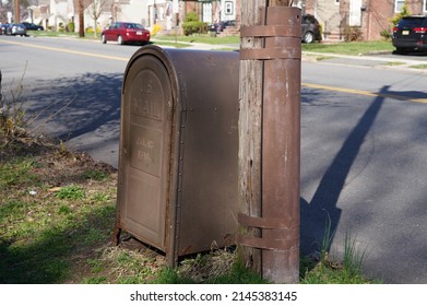 Brown Mailbox By Light Post