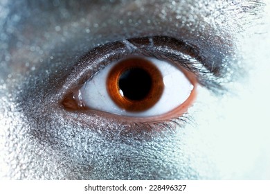 Brown Male Eyes With Dilated Pupil Closeup