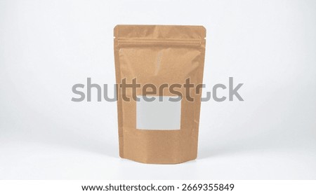 Brown matte doypack packaging pouch filled with product . isolated on a white backgro