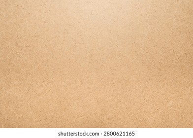Brown MDF Board Texture Background.
Flat lay close-up of a smooth brown MDF (Medium-Density Fibreboard) panel texture. This high-resolution wood fiber compressed board features fine organic particles and a clean, neutral surface, making it ideal for industrial design mockups, carpentry concepts, or minimalist rustic backgrounds.