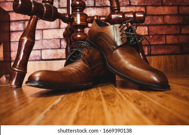 Brown Men's Shoes On Wood